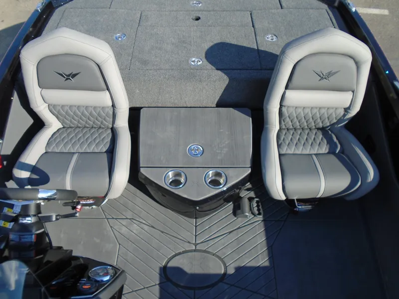 Slide: The Image of 2024 Vexus VX20 boat interior with two cushioned seats and center console. - 7
