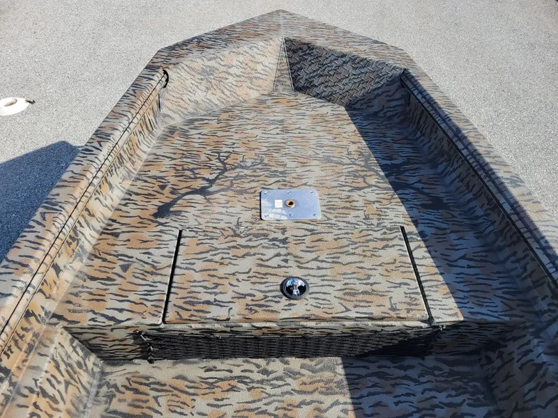 Slide: The Image of 2024 Xpress HD15DBX duck hunting boat with camouflage pattern, in stock. - 7