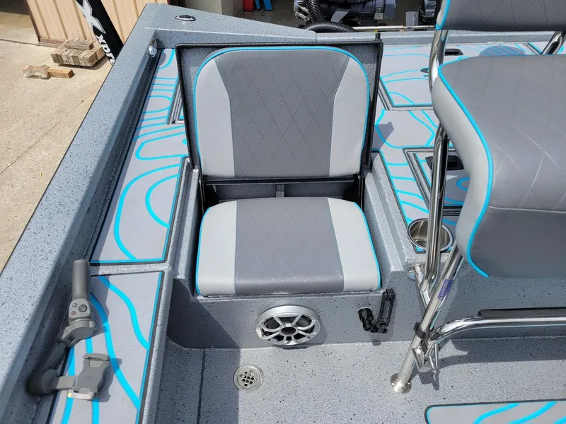 Slide: The Image of 2024 Xpress X23 Bay Lounge boat interior with dual Yamaha 150 engines. - 10