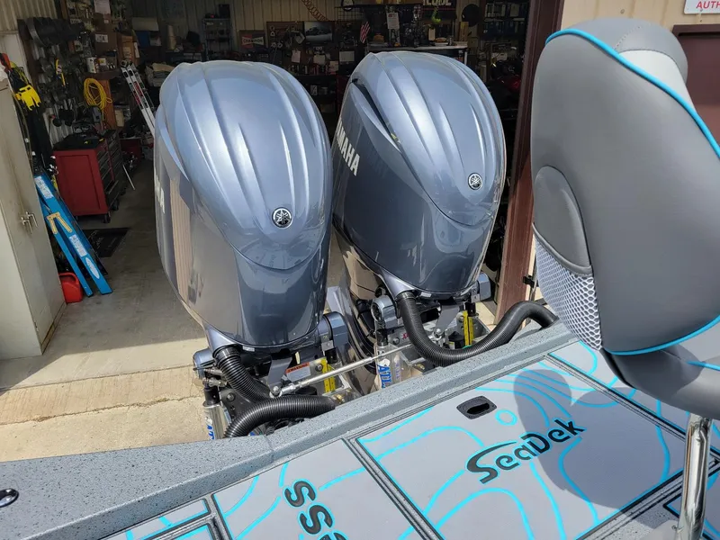 Slide: The Image of 2024 Xpress X23 Bay Lounge with dual Yamaha 150 engines, SeaDek flooring, in stock. - 11