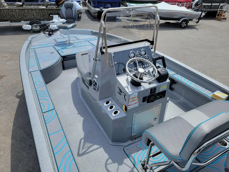 Slide: The Image of 2024 Xpress X23 Bay Lounge boat with dual Yamaha 150 engines, featuring a modern console and seating. - 18