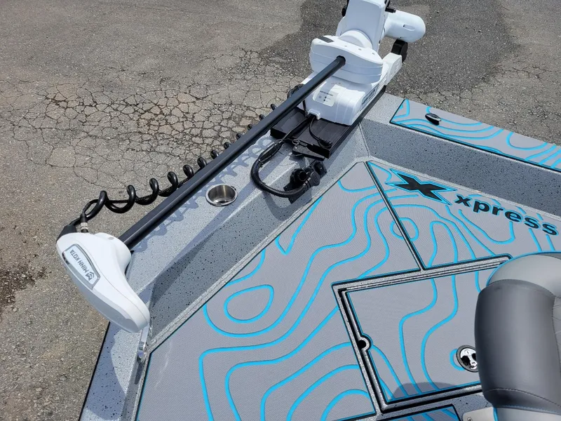 Slide: The Image of 2024 Xpress X23 Bay Lounge with dual Yamaha 150s, featuring a Minn Kota trolling motor. - 7