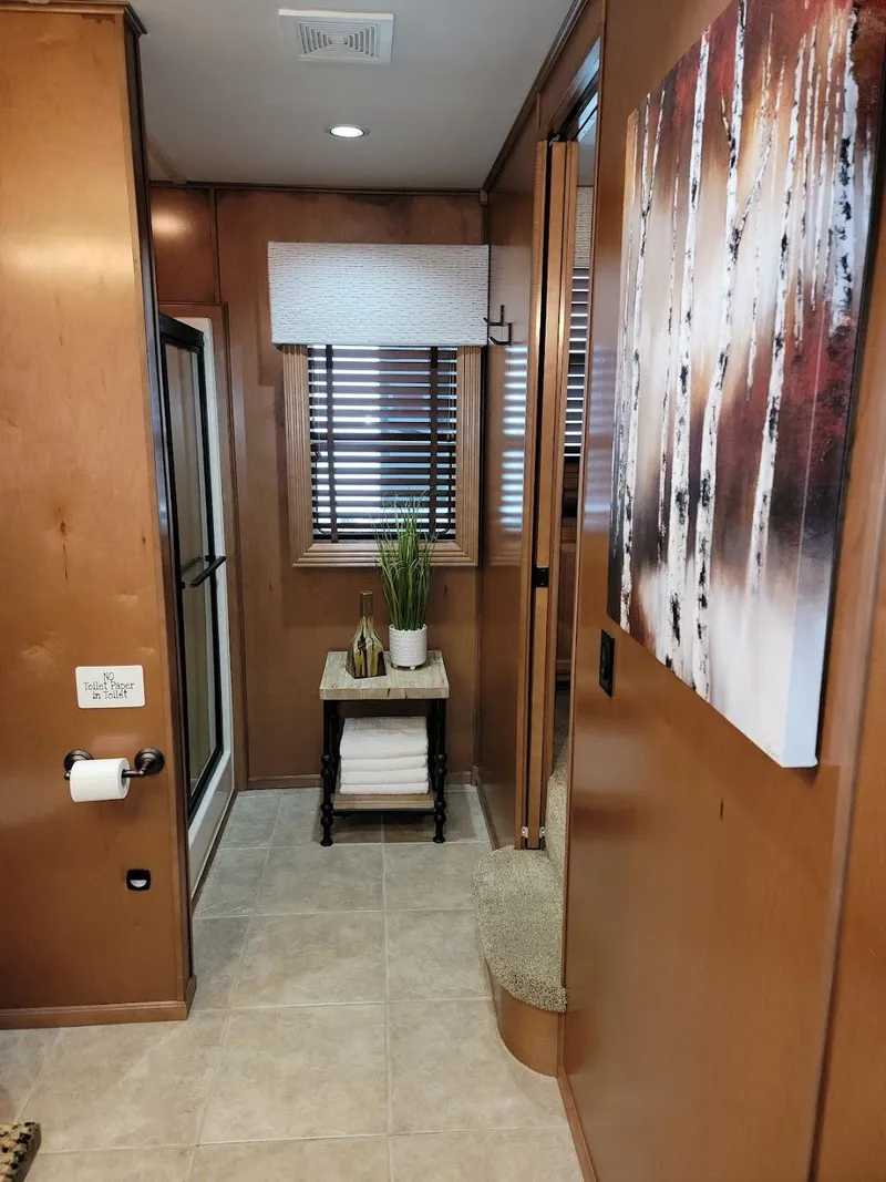 Slide: The Image of 2008 Sumerset Houseboat interior with modern decor and wooden finishes. - 24