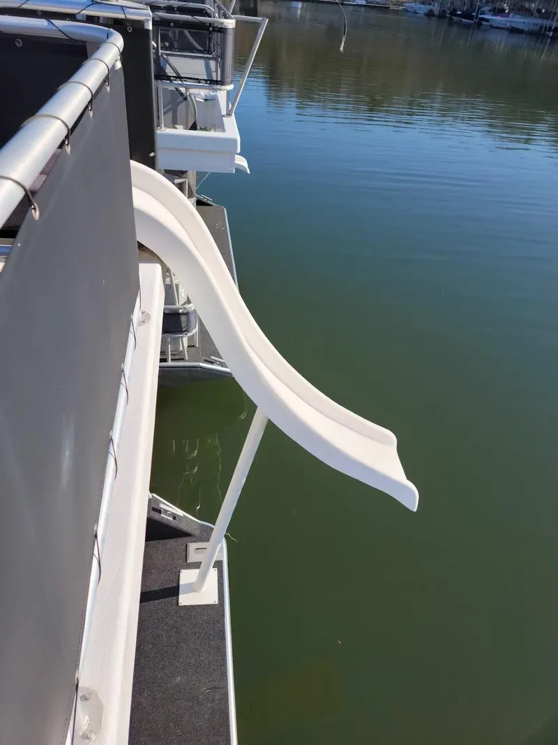 Slide: The Image of 2008 Sumerset Houseboat with water slide on a calm lake. - 40