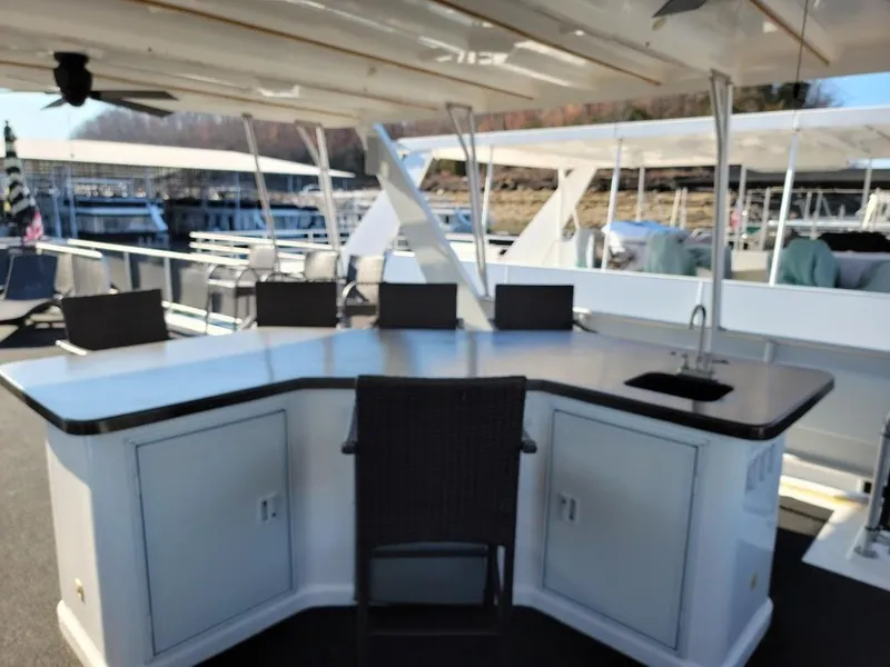 Slide: The Image of 2008 Sumerset Houseboat with outdoor bar and seating area. - 48