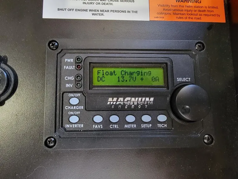 Slide: The Image of Magnum Energy charger display on 2008 Sumerset Houseboat showing float charging status. - 7