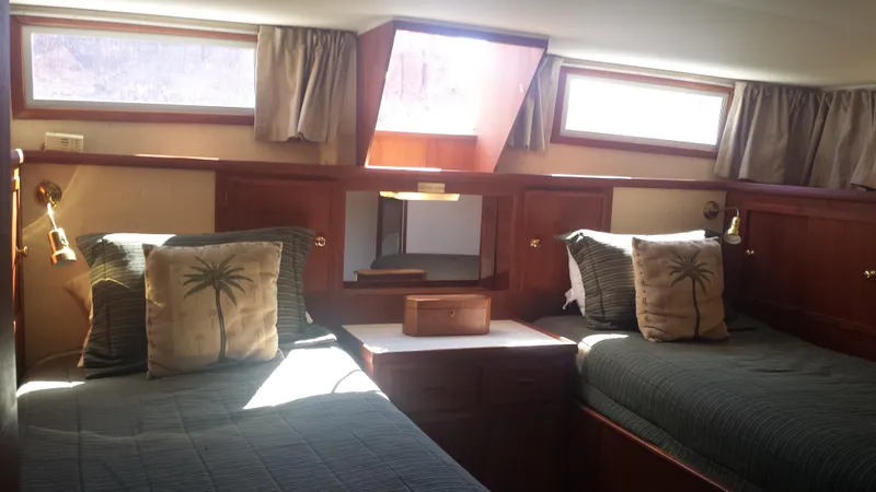 Slide: The Image of 1975 Uniflite Aft Cabin interior with twin beds. - 18