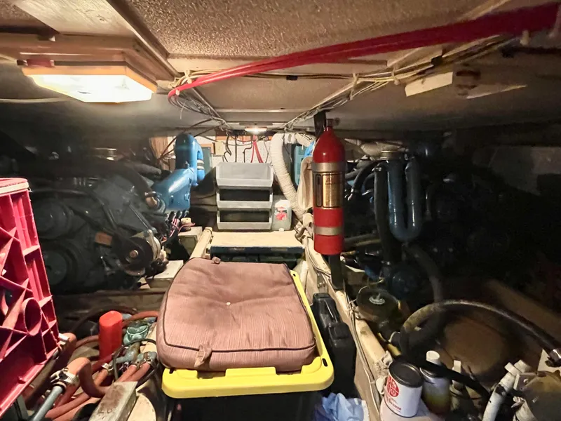 Slide: The Image of Engine room of a 1975 Uniflite Aft Cabin boat with equipment. - 33