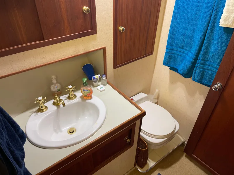 Slide: The Image of 1975 Uniflite Aft Cabin bathroom with sink and toilet. - 39