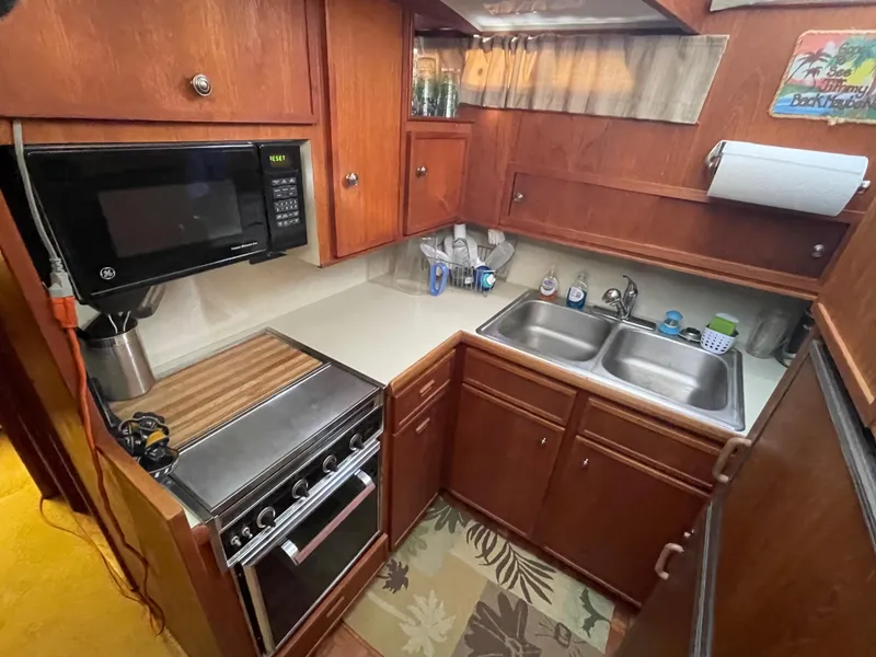 Slide: The Image of Kitchen in a 1975 Uniflite Aft Cabin yacht. - 42