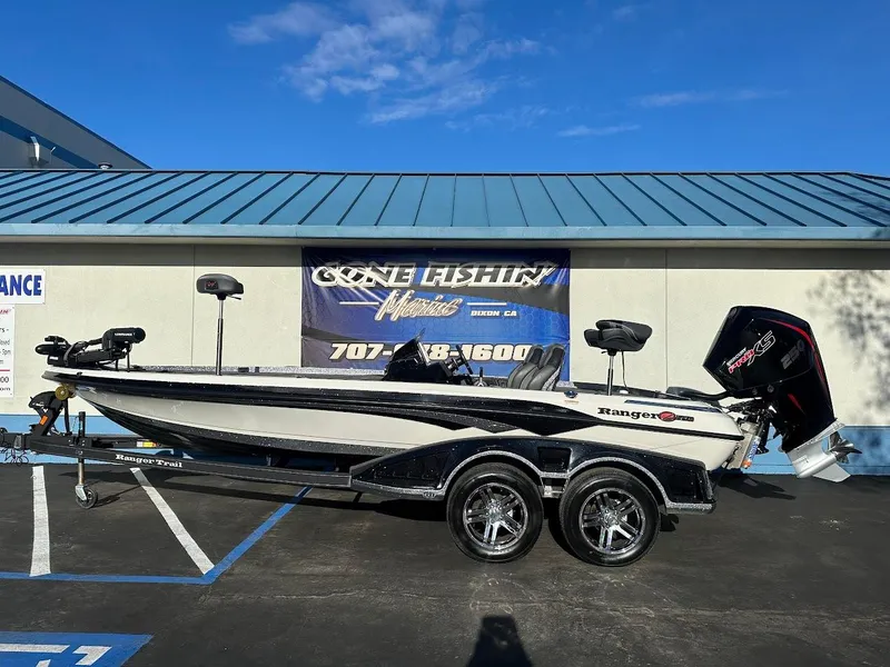 Slide: The Image of 2024 Ranger Z520R Ranger Cup Equipped boat parked outside a building. - 0