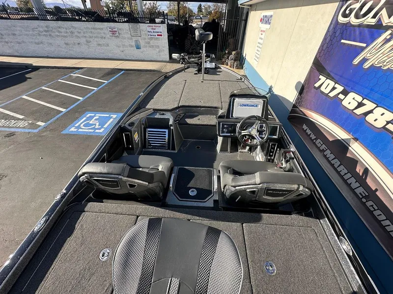Slide: The Image of 2024 Ranger Z520R Ranger Cup Equipped boat interior, featuring advanced controls and seating. - 10