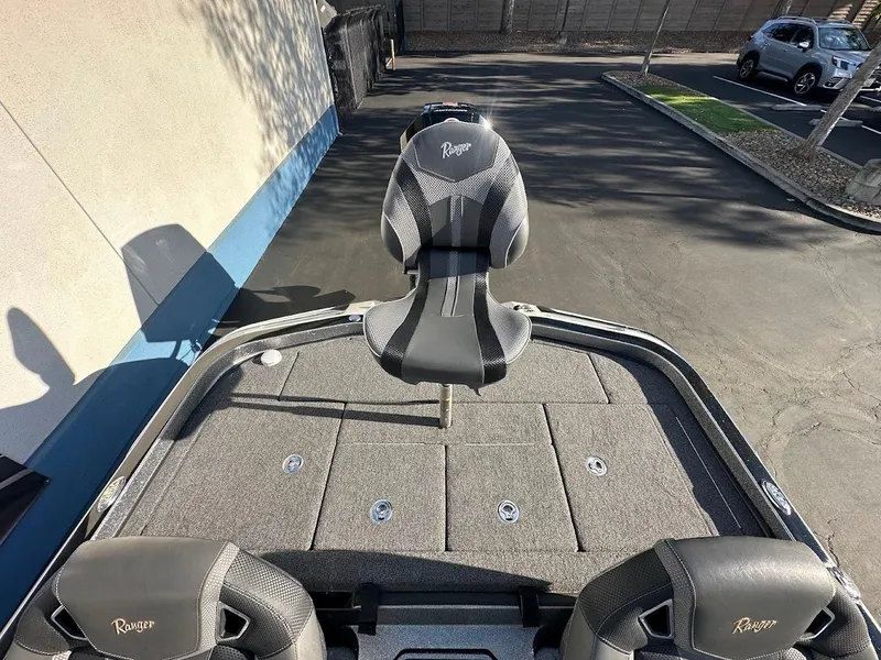 Slide: The Image of 2024 Ranger Z520R boat interior with premium seating and spacious deck. - 11