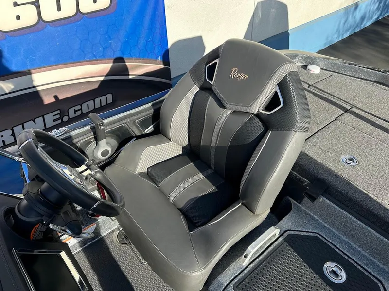 Slide: The Image of 2024 Ranger Z520R boat seat with sleek black and gray design. - 12