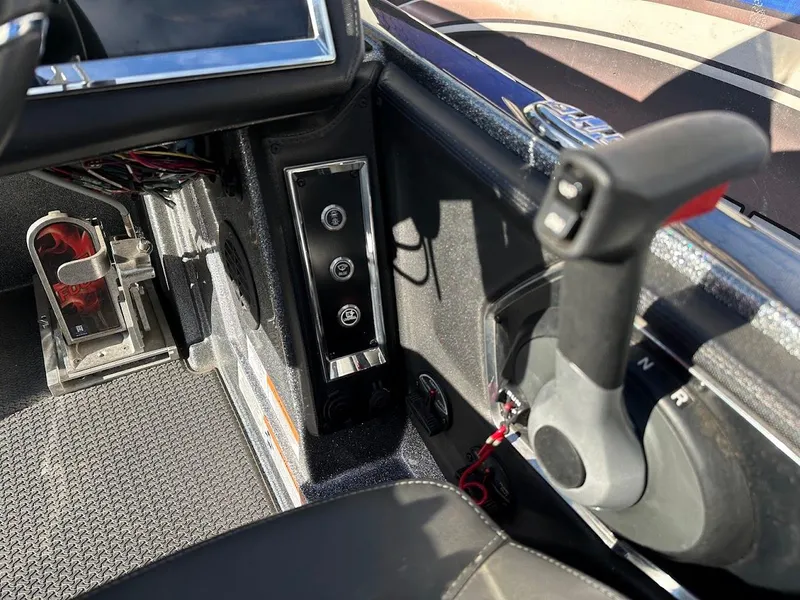 Slide: The Image of 2024 Ranger Z520R Ranger Cup Equipped boat interior controls and dashboard. - 16