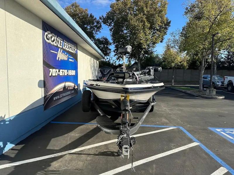 Slide: The Image of 2024 Ranger Z520R Ranger Cup boat parked outside dealership. - 2