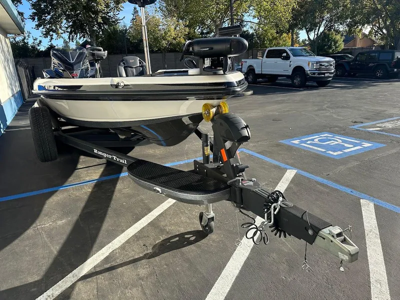 Slide: The Image of 2024 Ranger Z520R boat on trailer in parking lot. - 3