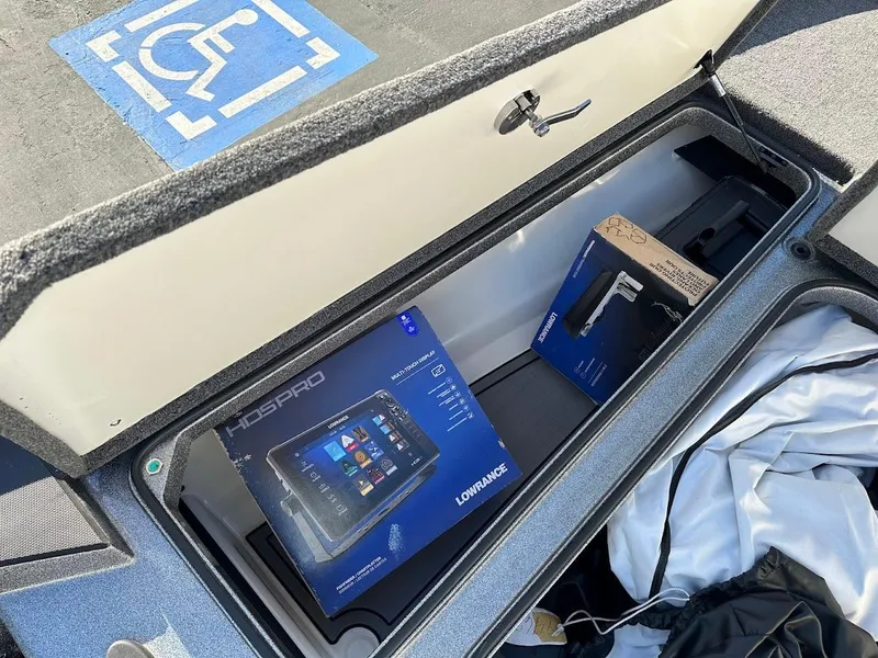 Slide: The Image of 2024 Ranger Z520R storage compartment with Lowrance HDS PRO equipment. - 32