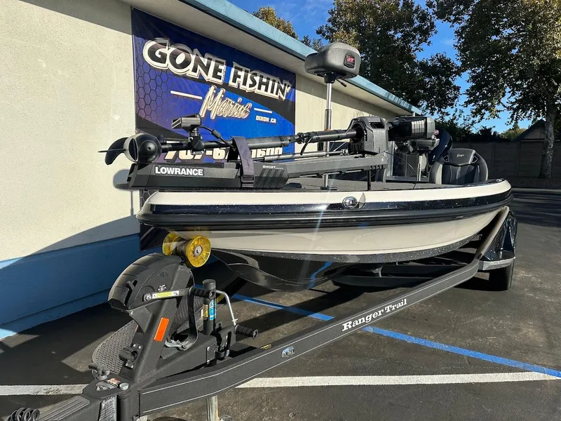 Slide: The Image of 2024 Ranger Z520R fishing boat on trailer outside dealership. - 4