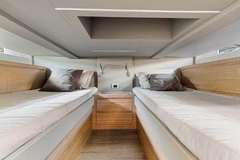Slide: The Image of 2023 Astondoa 377 Coupe Outboard cabin with twin beds and modern design. - 25