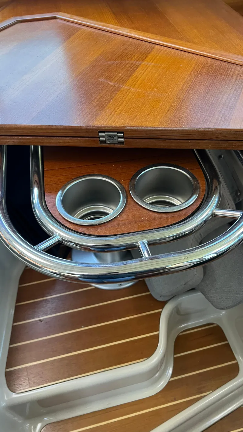 Slide: The Image of Ranger Tugs R29S 2014 interior with wooden table and cup holders. - 13