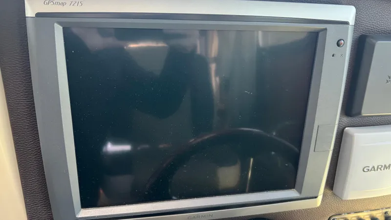 Slide: The Image of Garmin GPSmap 7215 display on 2014 Ranger Tugs R29S boat dashboard. - 25