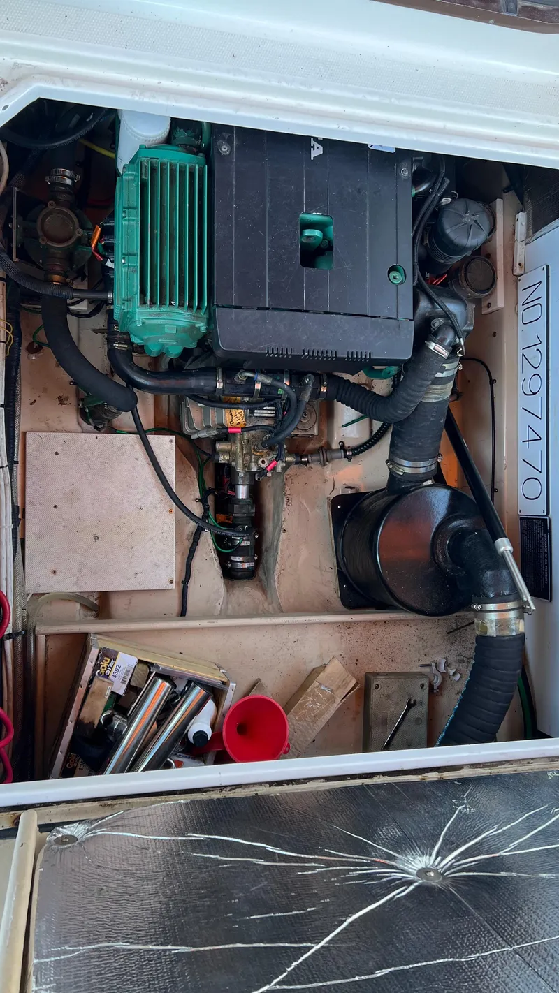 Slide: The Image of Engine compartment of 2014 Ranger Tugs R29S with visible components and equipment. - 38