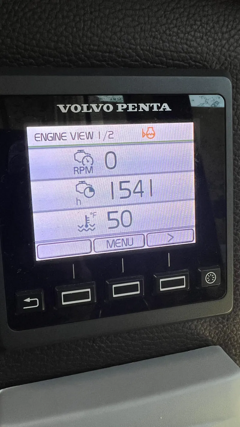 Slide: The Image of Volvo Penta engine display on 2014 Ranger Tugs R29S showing RPM and temperature. - 43