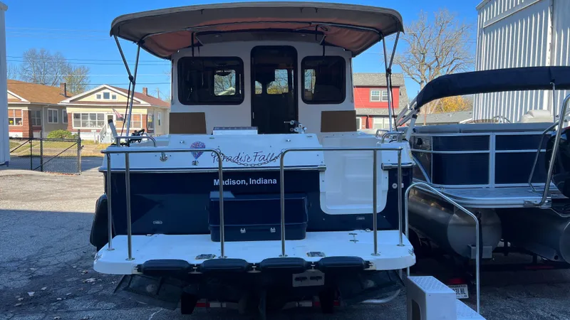 Slide: The Image of 2014 Ranger Tugs R29S boat docked in Madison, Indiana. - 5