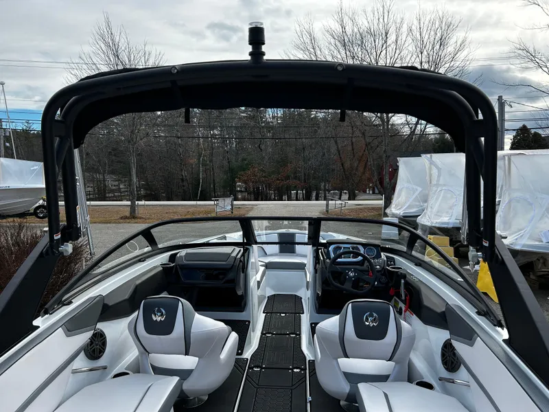 Slide: The Image of 2024 Scarab 215 Wake LE boat interior with seating and dashboard. - 32