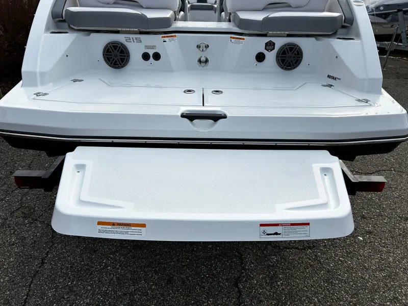 Slide: The Image of 2024 Scarab 215 Wake LE boat rear view with swim platform and speakers - 5