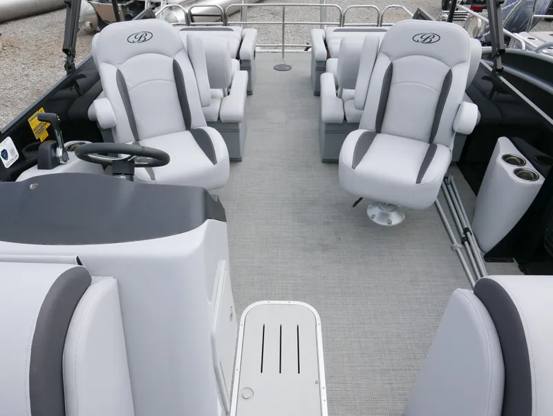 Slide: The Image of 2024 Bentley Pontoons Legacy 223 QSB interior with plush seating and modern design. - 11