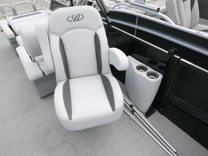 Slide: The Image of 2024 Bentley Pontoons Legacy 223 QSB interior with plush seating and cup holders. - 12
