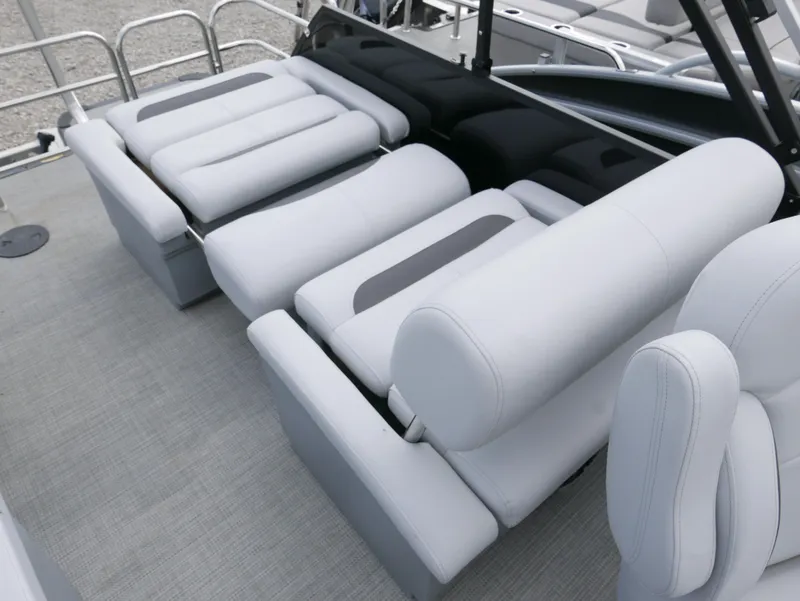 Slide: The Image of 2024 Bentley Pontoons Legacy 223 QSB interior with luxurious seating and modern design. - 18