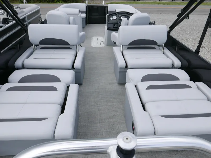 Slide: The Image of 2024 Bentley Pontoons Legacy 223 QSB interior with luxurious seating arrangement. - 20