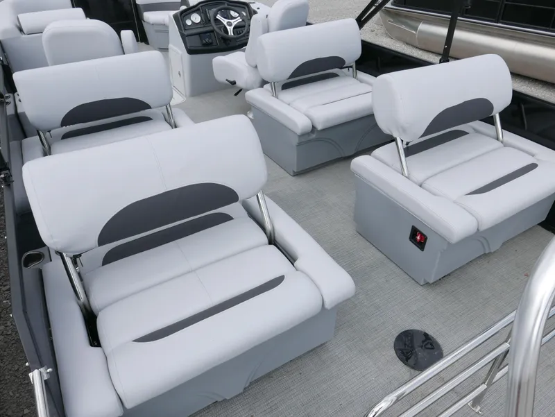Slide: The Image of 2024 Bentley Pontoons Legacy 223 QSB interior with plush seating and modern dashboard. - 22