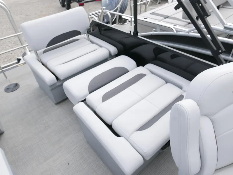 Slide: The Image of 2024 Bentley Pontoons Legacy 223 QSB interior with luxurious white seating. - 28