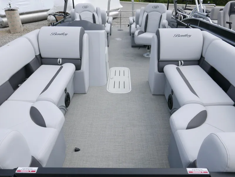 Slide: The Image of 2024 Bentley Pontoons Legacy 223 QSB interior with luxurious seating and modern design. - 4