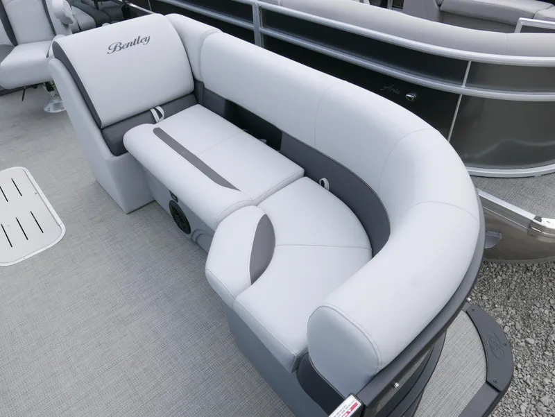 Slide: The Image of 2024 Bentley Pontoons Legacy 223 QSB interior seating, featuring luxurious gray upholstery. - 5