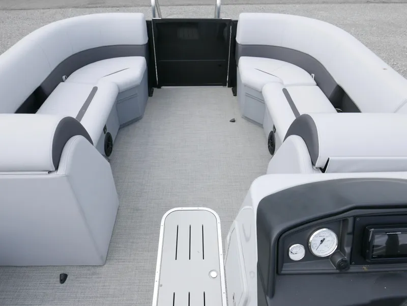 Slide: The Image of 2024 Bentley Pontoons Legacy 223 QSB interior with gray seating and modern dashboard. - 8