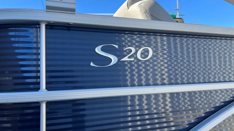 Slide: The Image of Close-up of 2021 Bennington S20 boat exterior with model name. - 1
