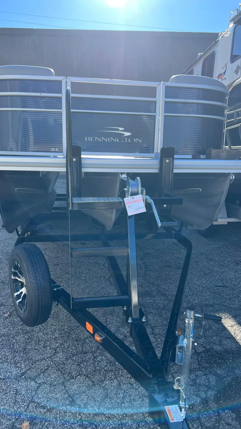 Slide: The Image of 2021 Bennington S20 pontoon boat on a trailer, front view. - 14