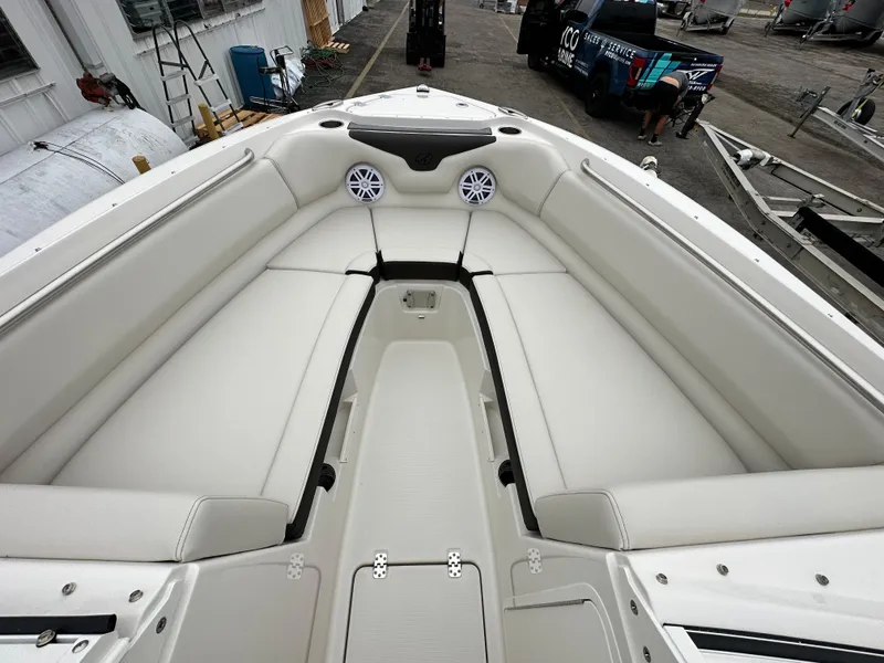 Slide: The Image of 2024 Sailfish 226 DC boat with spacious bow seating and built-in speakers. - 27