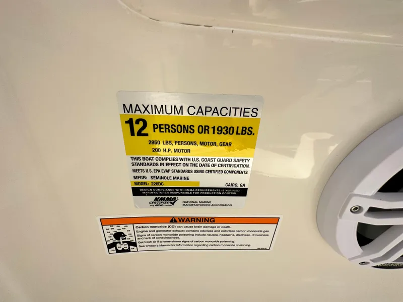 Slide: The Image of 2024 Sailfish 226 DC capacity label, maximum 12 persons or 1930 lbs, safety compliance details. - 36