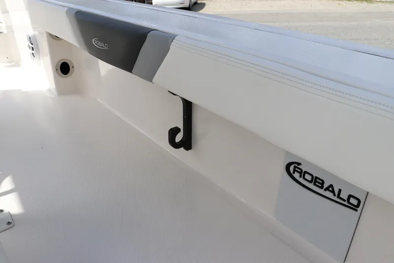 Slide: The Image of 2024 Robalo 226 Cayman boat interior detail with branding. - 11