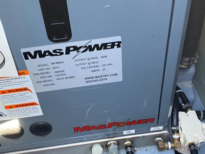 Slide: The Image of MasPower generator in a 2014 Com-Pac 27 sailboat. - 11