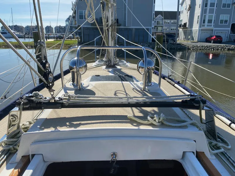 Slide: The Image of Com-Pac 27 sailboat deck view, docked in a marina, 2014 model. - 5