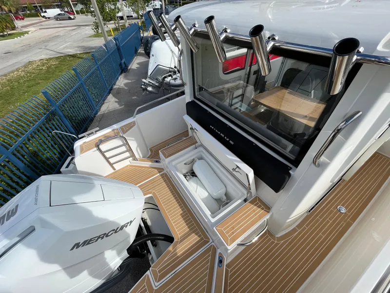 Slide: The Image of 2024 Nimbus Commuter 9 #136 boat with Mercury engine and teak deck. - 10