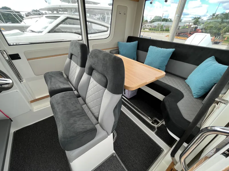 Slide: The Image of Interior of 2024 Nimbus Commuter 9 #136 with seating and dining area. - 19