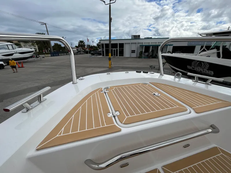 Slide: The Image of 2024 Nimbus Commuter 9 #136 boat deck with tan and white design. - 29